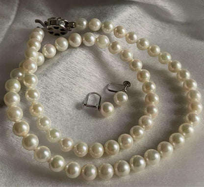 Akoya pearl necklace with 6.5-7mm pearls and matching 7mm pearl earrings set in K14 white gold