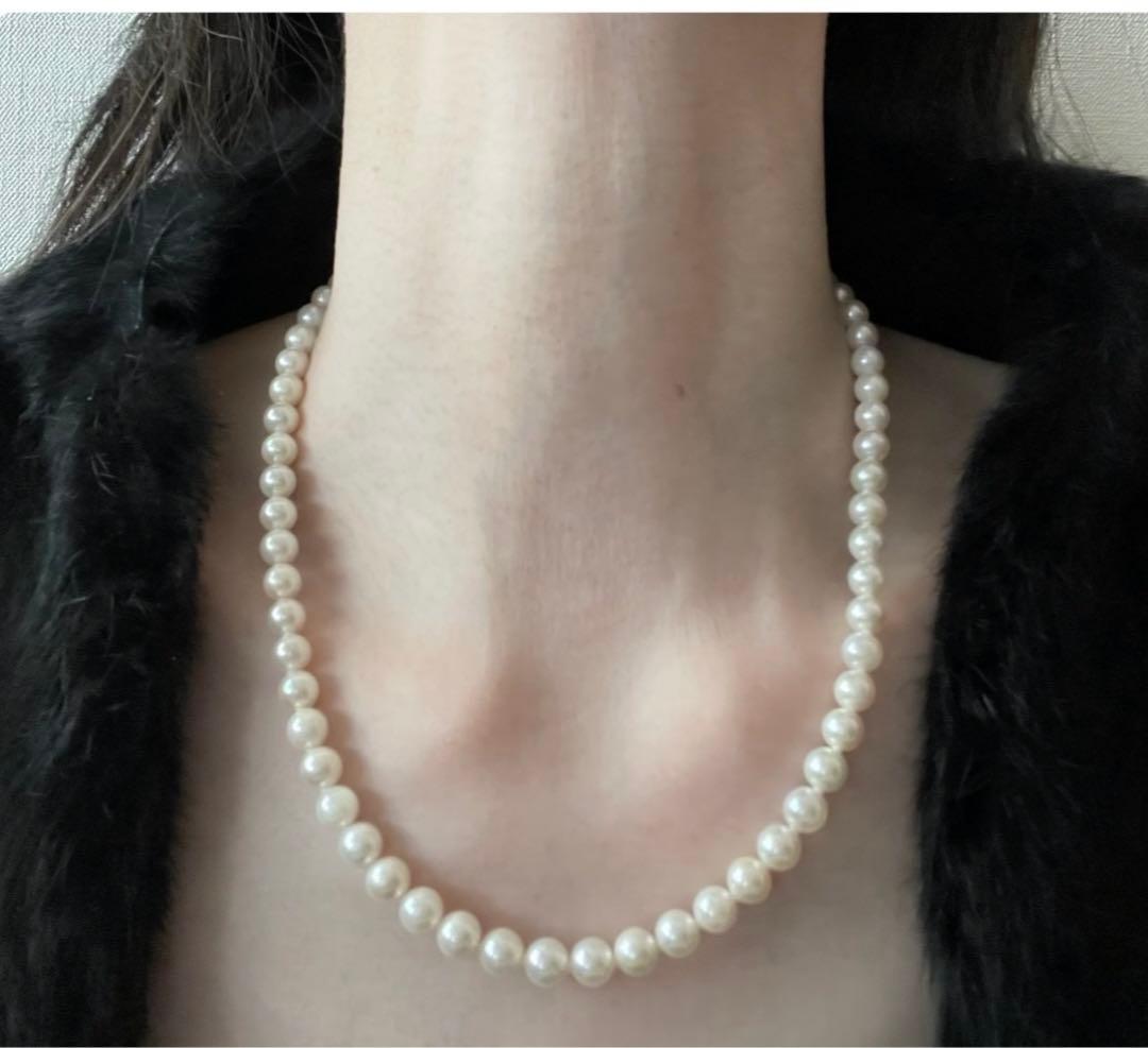 Akoya pearl necklace with 6.5-7mm pearls and matching 7mm pearl earrings set in K14 white gold