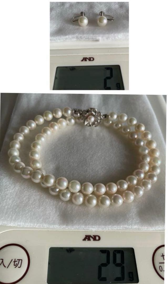 Akoya pearl necklace with 6.5-7mm pearls and matching 7mm pearl earrings set in K14 white gold