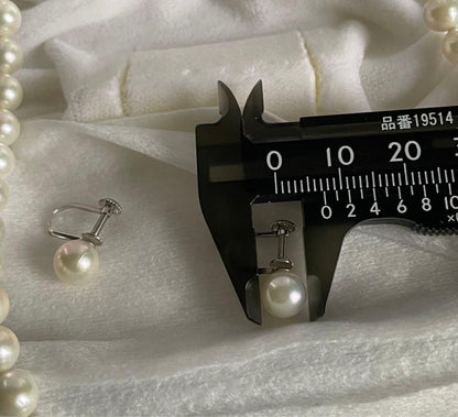 Akoya pearl necklace with 6.5-7mm pearls and matching 7mm pearl earrings set in K14 white gold
