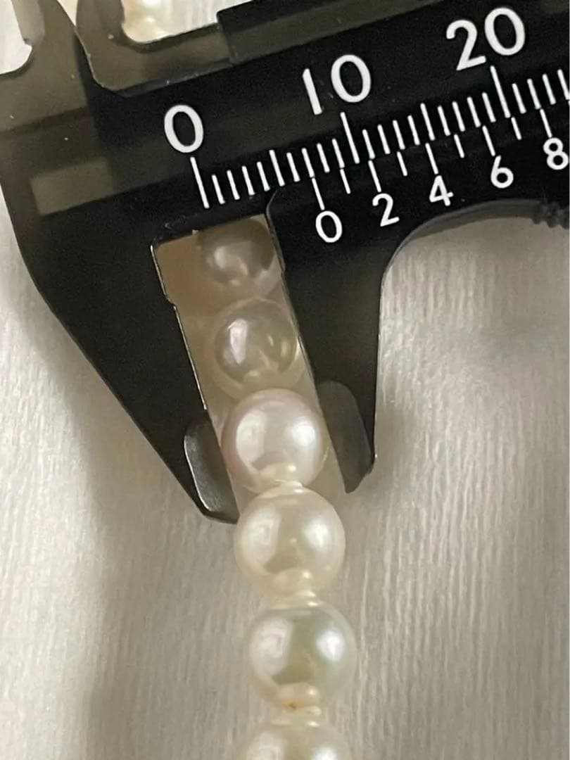 Akoya pearl necklace with 6.5-7mm pearls and matching 7mm pearl earrings set in K14 white gold