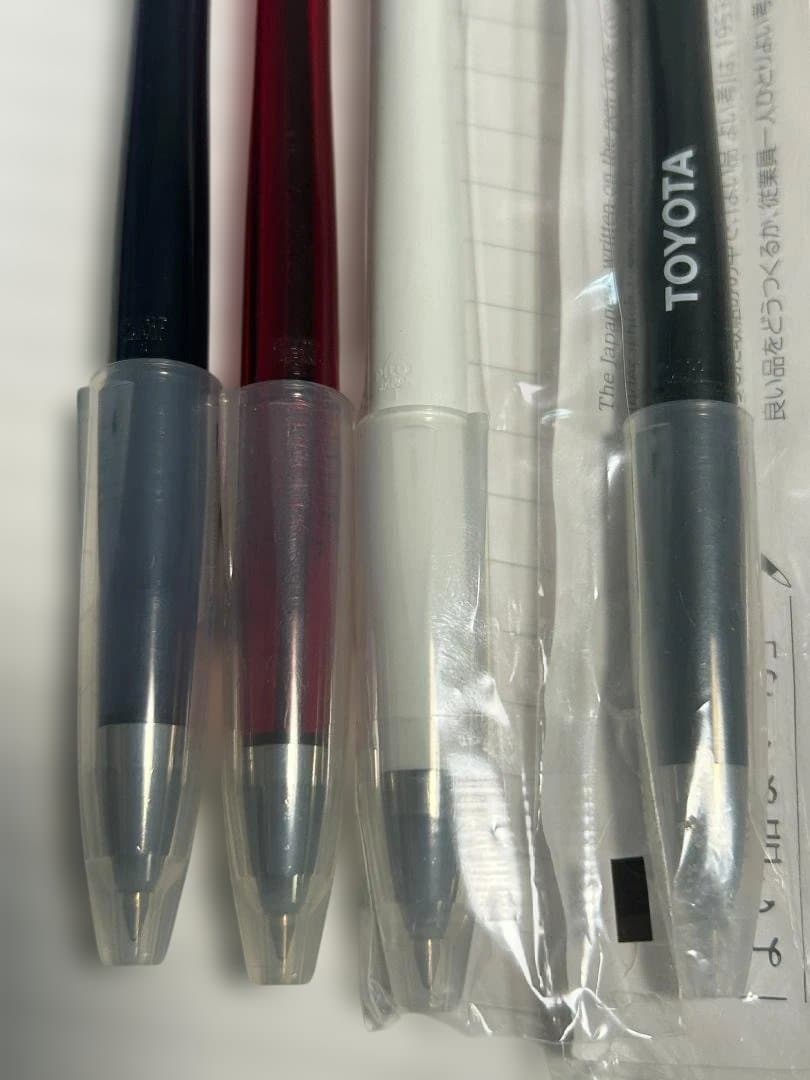 Four Pilot Desk Pens BDE-15 in discarded rare colors transparent purple, red, white, and black resin metal