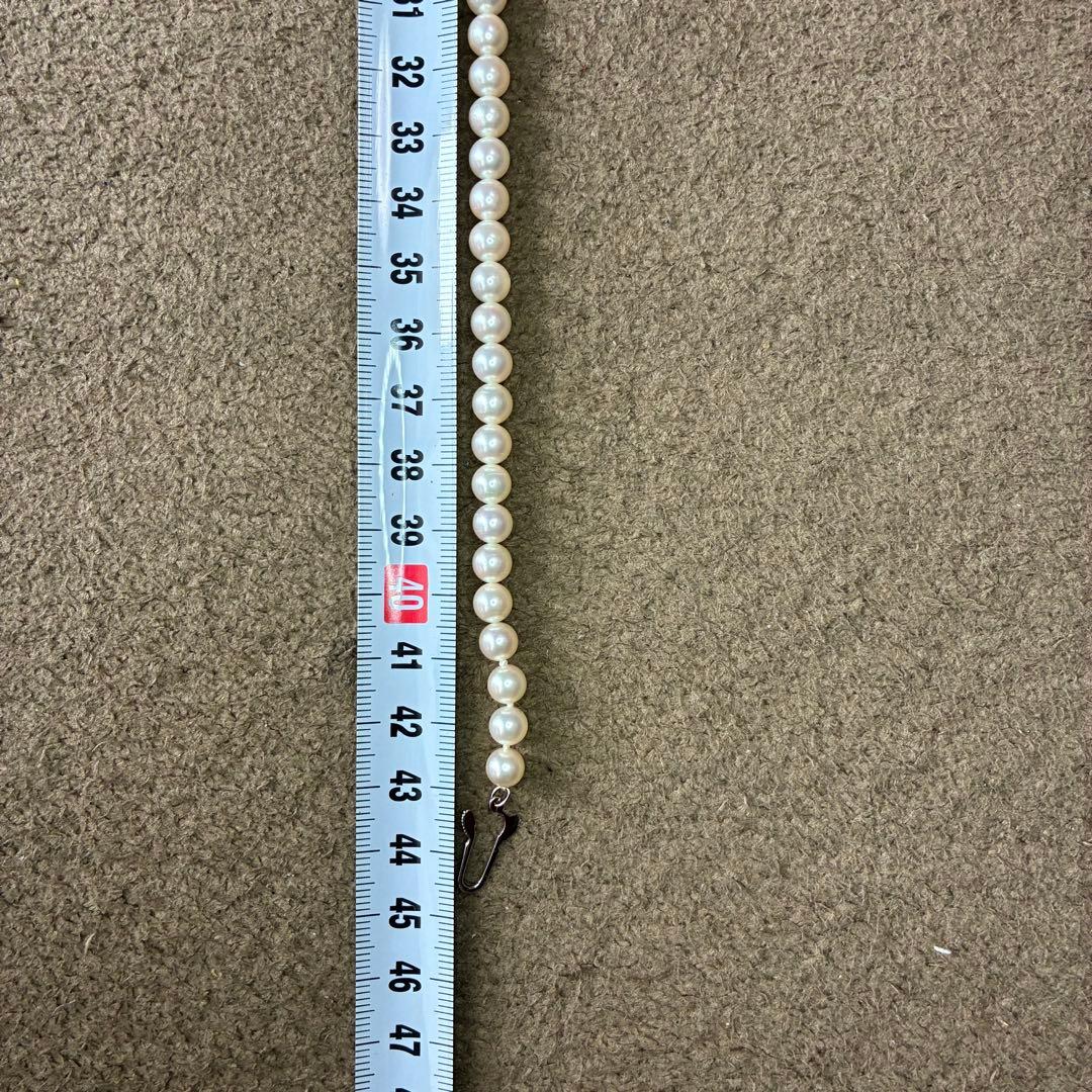 Mikimoto Akoya pearl necklace with 14k clasp featuring 6.0-6.5mm pearls and 44.5cm total length