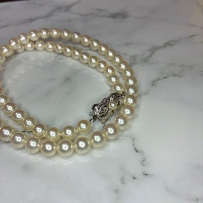 Mikimoto Akoya pearl necklace with 14k clasp featuring 6.0-6.5mm pearls and 44.5cm total length