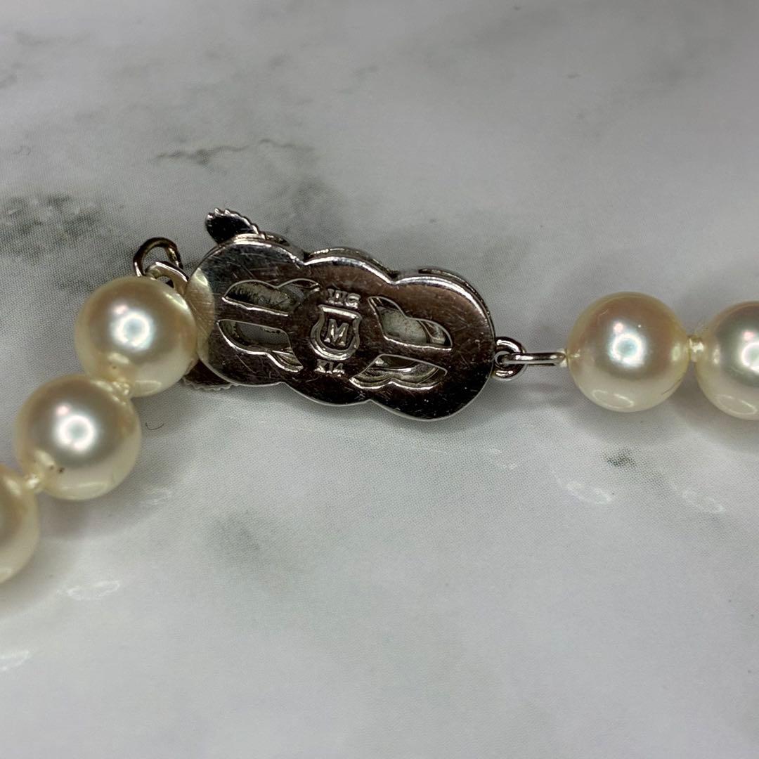 Mikimoto Akoya pearl necklace with 14k clasp featuring 6.0-6.5mm pearls and 44.5cm total length