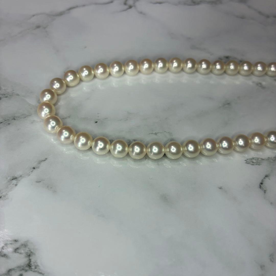 Mikimoto Akoya pearl necklace with 14k clasp featuring 6.0-6.5mm pearls and 44.5cm total length