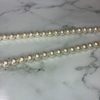 Mikimoto Akoya pearl necklace with 14k clasp featuring 6.0-6.5mm pearls and 44.5cm total length