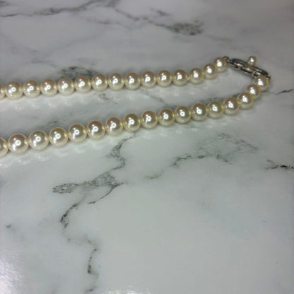 Mikimoto Akoya pearl necklace with 14k clasp featuring 6.0-6.5mm pearls and 44.5cm total length
