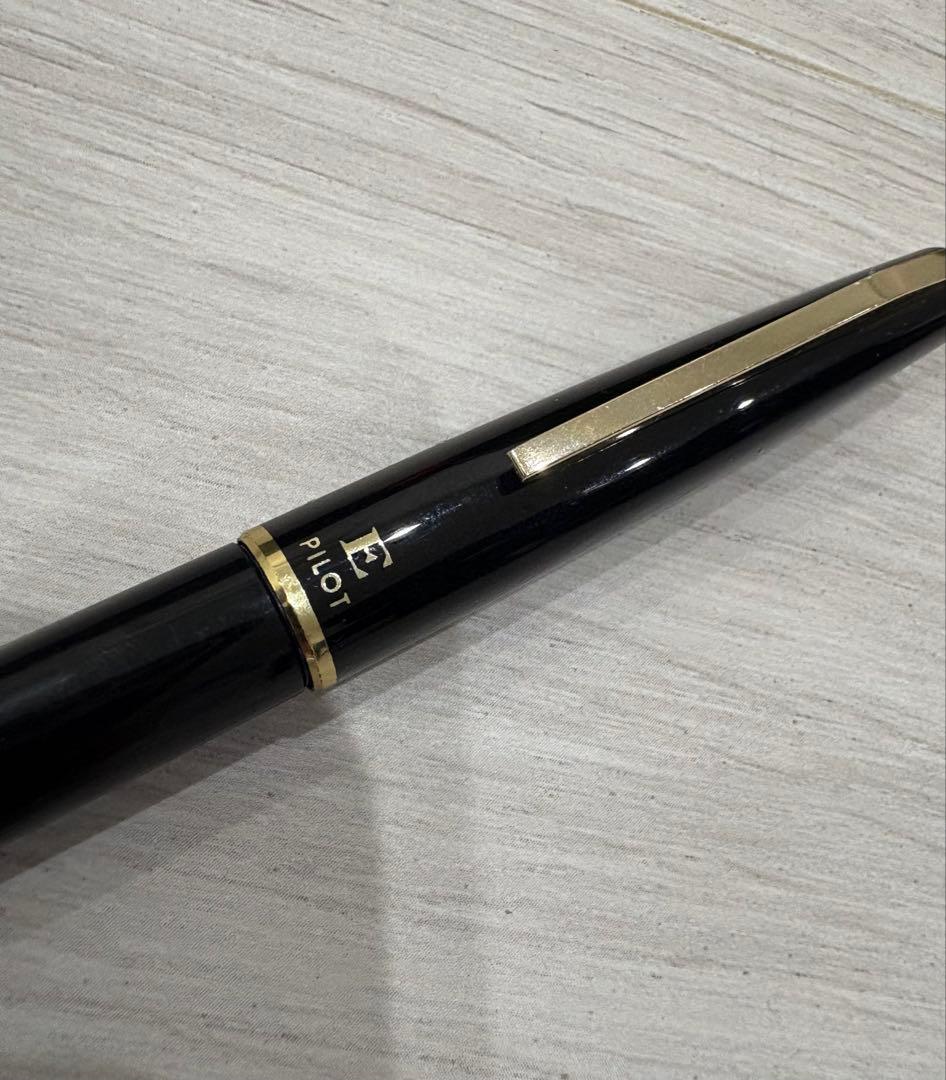 Black Pilot fountain pen with 14K gold tip shown on white background