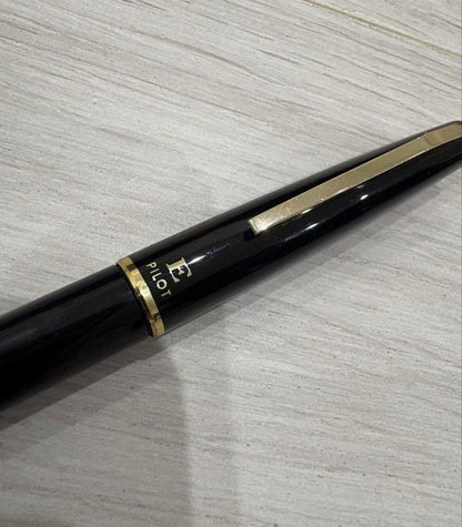 Black Pilot fountain pen with 14K gold tip shown on white background
