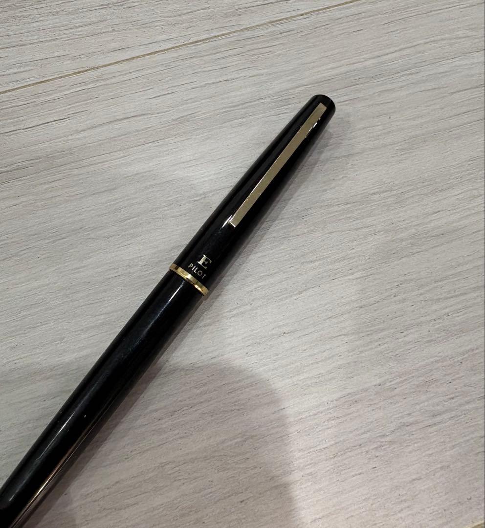 Black Pilot fountain pen with 14K gold tip shown on white background