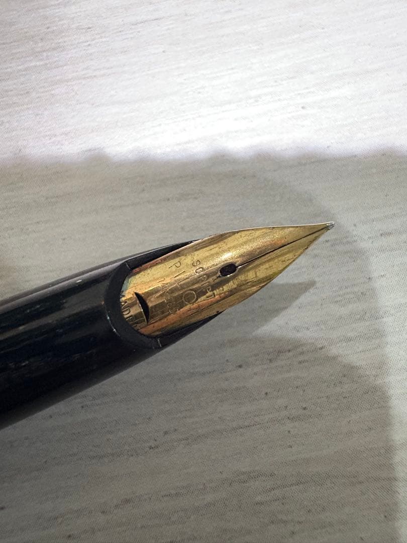Black Pilot fountain pen with 14K gold tip shown on white background