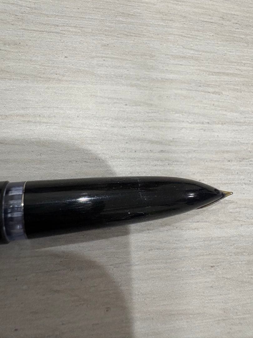 Black Pilot fountain pen with 14K gold tip shown on white background