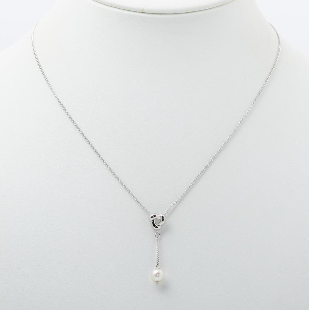 Tasaki pearl necklace with Y-shaped design featuring 6.8mm pearls and a 42.5cm chain