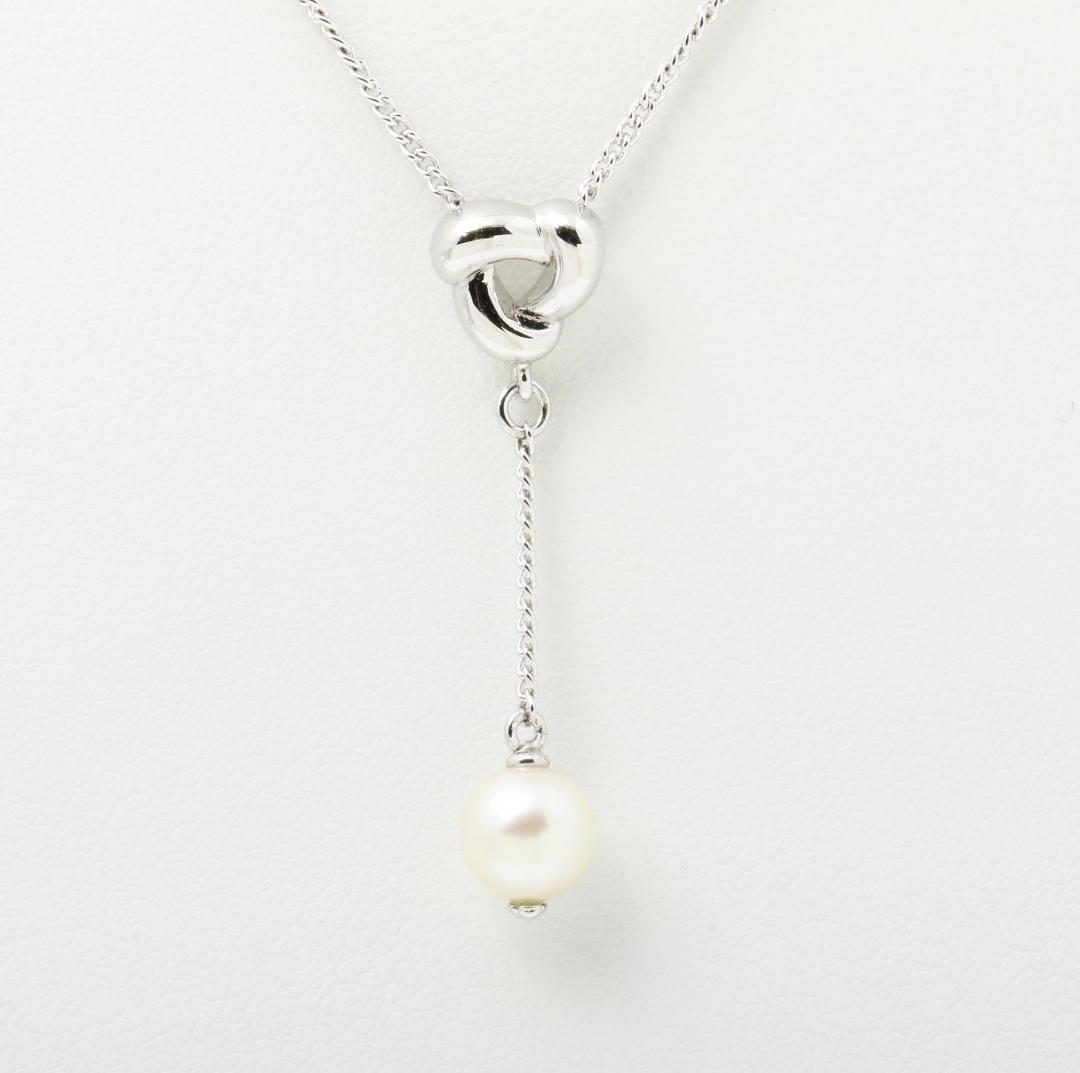 Tasaki pearl necklace with Y-shaped design featuring 6.8mm pearls and a 42.5cm chain