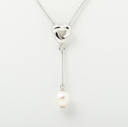 Tasaki pearl necklace with Y-shaped design featuring 6.8mm pearls and a 42.5cm chain