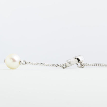 Tasaki pearl necklace with Y-shaped design featuring 6.8mm pearls and a 42.5cm chain