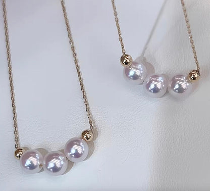 Akoya pearl smile necklace with 3 pearls and 18K gold pendant on a 45 cm chain