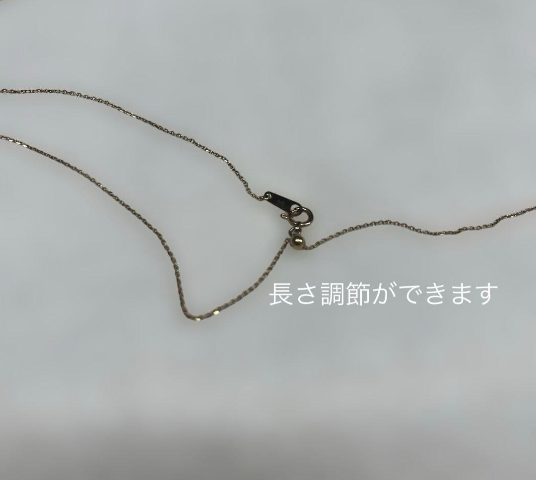 Agete necklace featuring a shell mark charm on a 41 cm chain displayed on white background