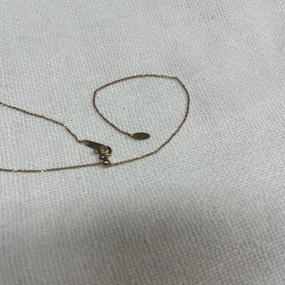Agete necklace featuring a shell mark charm on a 41 cm chain displayed on white background