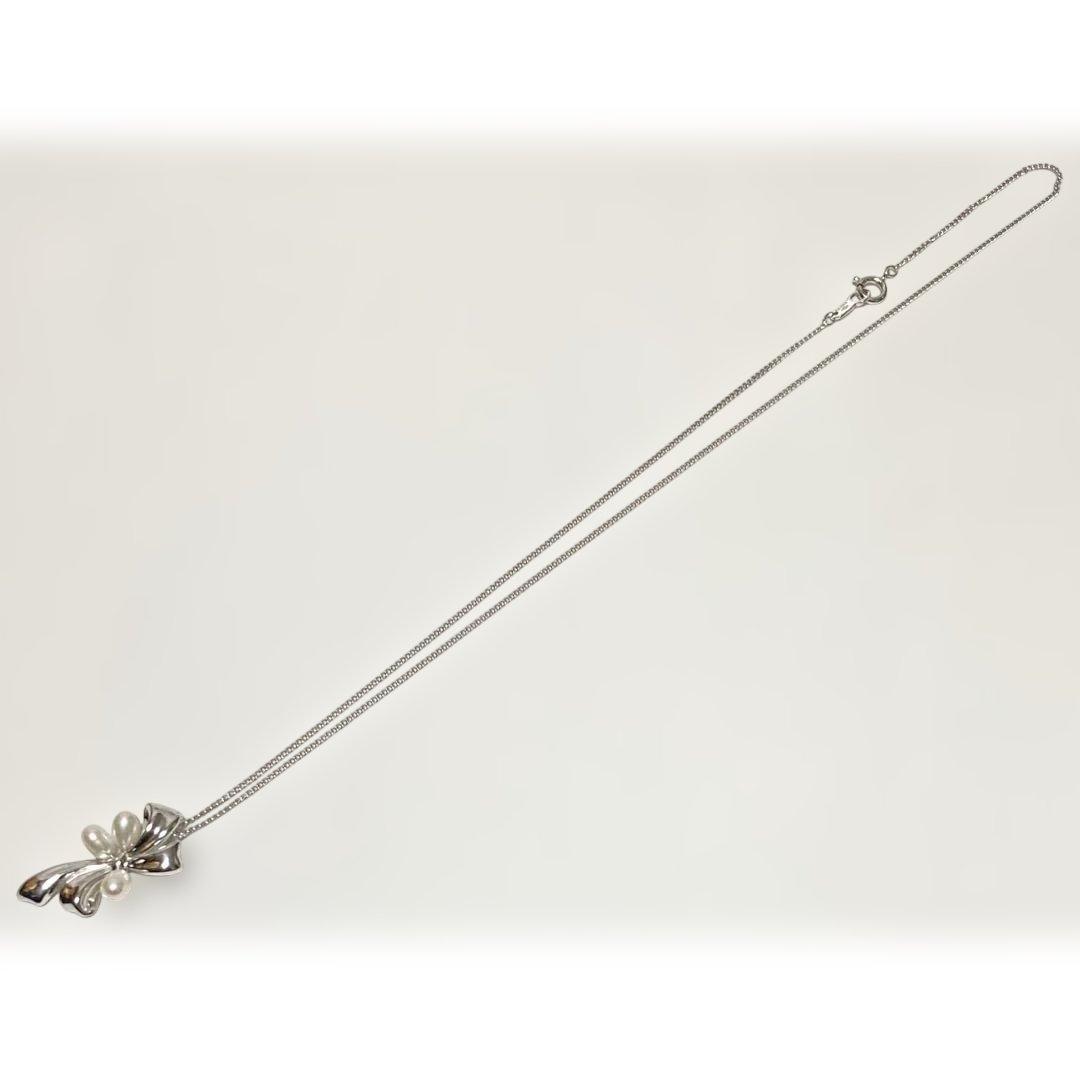 TASAKI vintage pearl necklace with ribbon design featuring genuine pearls on a 925 silver chain
