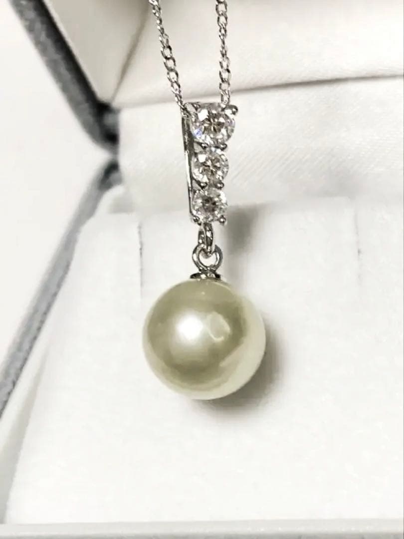 Akoya pearl pendant top with 9.5mm pearl and cubic zirconia set in silver