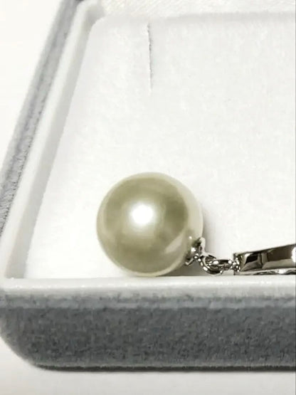 Akoya pearl pendant top with 9.5mm pearl and cubic zirconia set in silver