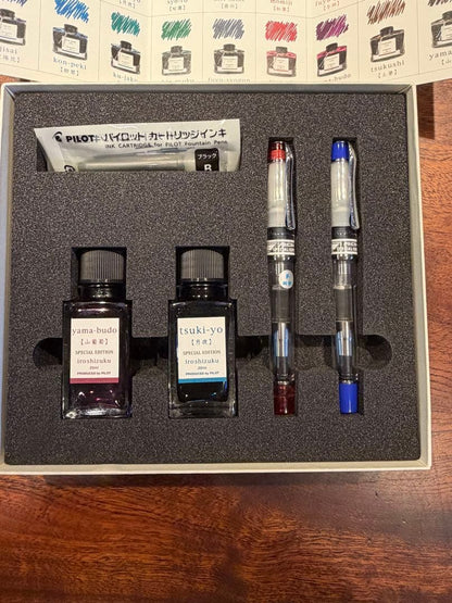 Pilot PRERA Special Edition fountain pen set with two pens, blue and red ink bottles, cartridges, and special box
