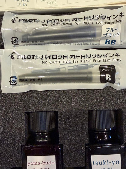 Pilot PRERA Special Edition fountain pen set with two pens, blue and red ink bottles, cartridges, and special box