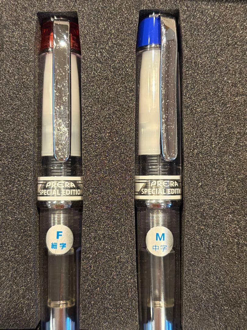 Pilot PRERA Special Edition fountain pen set with two pens, blue and red ink bottles, cartridges, and special box