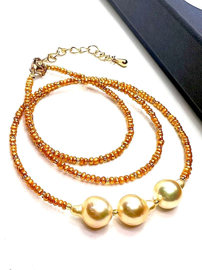 Gold Akoya pearl necklace with gold beads and baroque-shaped freshwater pearls on gold chain