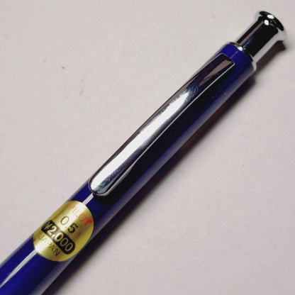 Discontinued Pilot Clutch Point mechanical pencil with metal tip and four-ring design on a white background