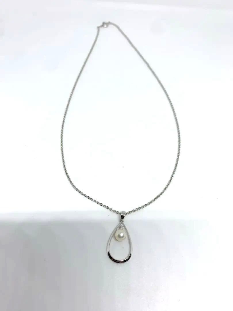 MIKIMOTO Akoya pearl necklace with silver chain, 45 cm long, displayed on white background