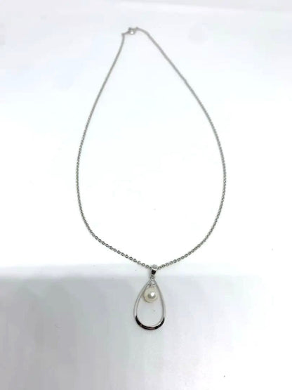 MIKIMOTO Akoya pearl necklace with silver chain, 45 cm long, displayed on white background