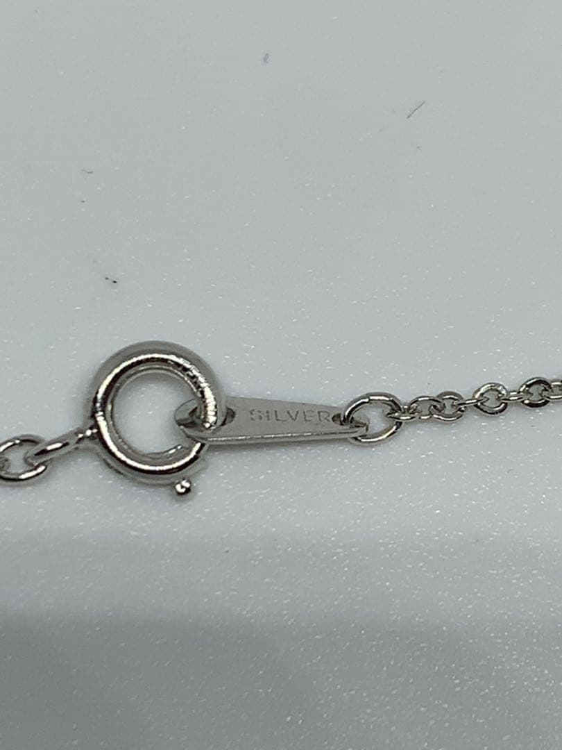 MIKIMOTO Akoya pearl necklace with silver chain, 45 cm long, displayed on white background