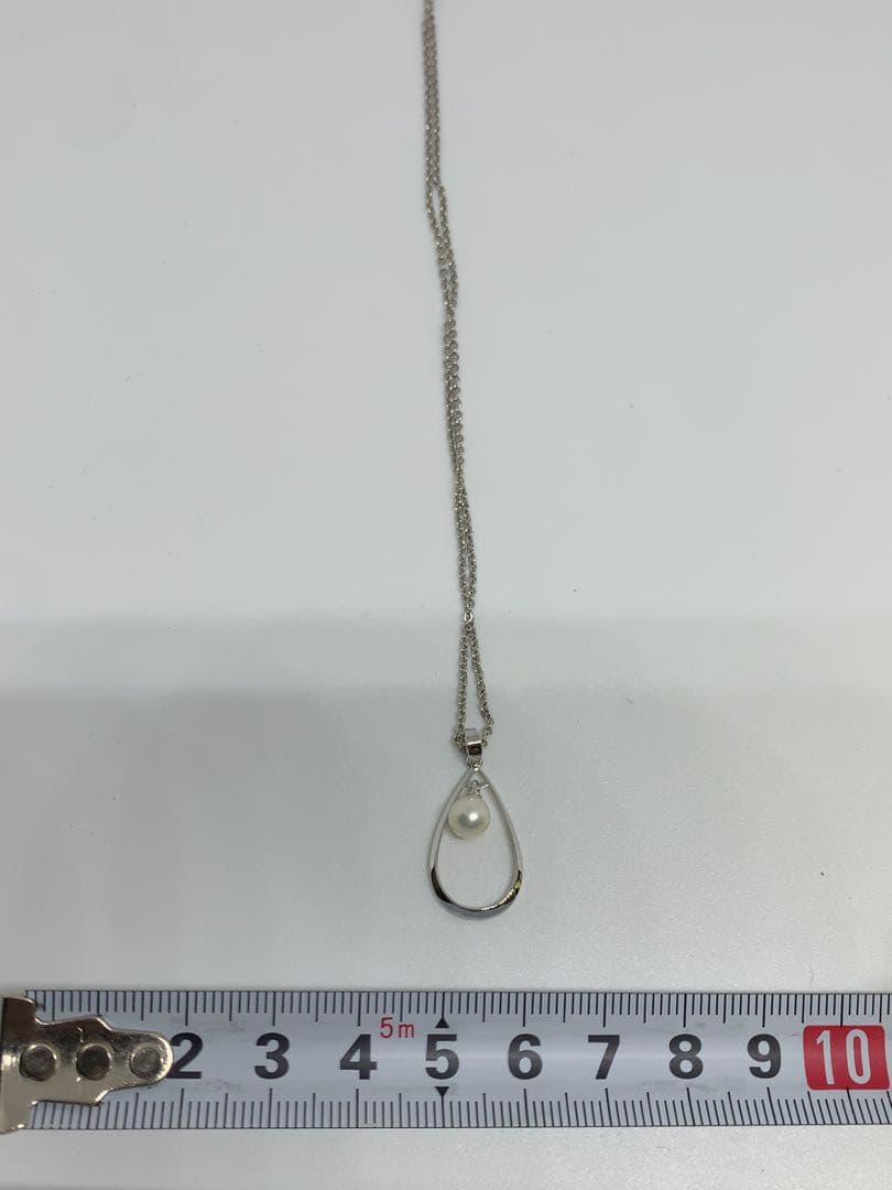 MIKIMOTO Akoya pearl necklace with silver chain, 45 cm long, displayed on white background