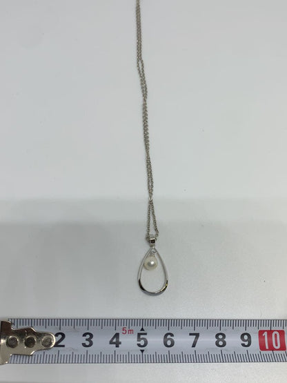 MIKIMOTO Akoya pearl necklace with silver chain, 45 cm long, displayed on white background