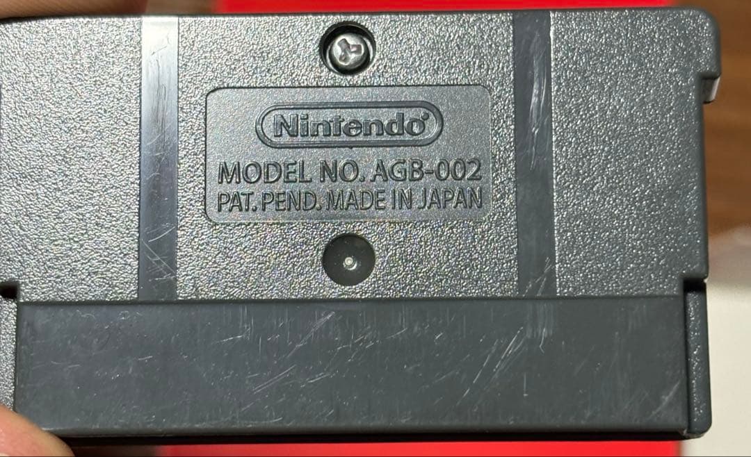 Mother 3 Game Boy Advance cartridge with manual and original box showing minor wear