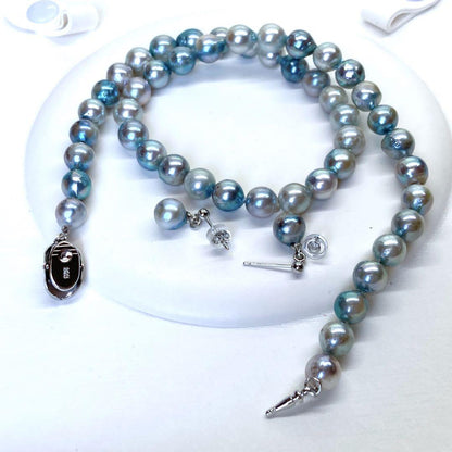 Akoya pearl necklace with silver gray bluish tint semi-round pearls measuring 7.5 to 8 millimeters on a 41.5 cm chain