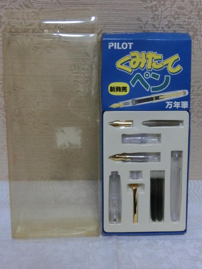 Pilot Kumitate fountain pen set in clear color with visible discoloration, scratches, and cracks