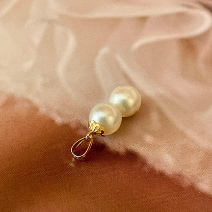 Lotus Law necklace featuring 6 mm genuine Akoya baroque pearls on 18K yellow gold chain 2 cm length