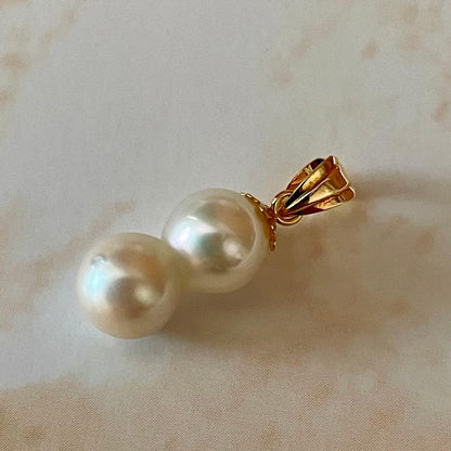 Lotus Law necklace featuring 6 mm genuine Akoya baroque pearls on 18K yellow gold chain 2 cm length