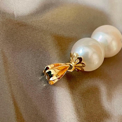 Lotus Law necklace featuring 6 mm genuine Akoya baroque pearls on 18K yellow gold chain 2 cm length