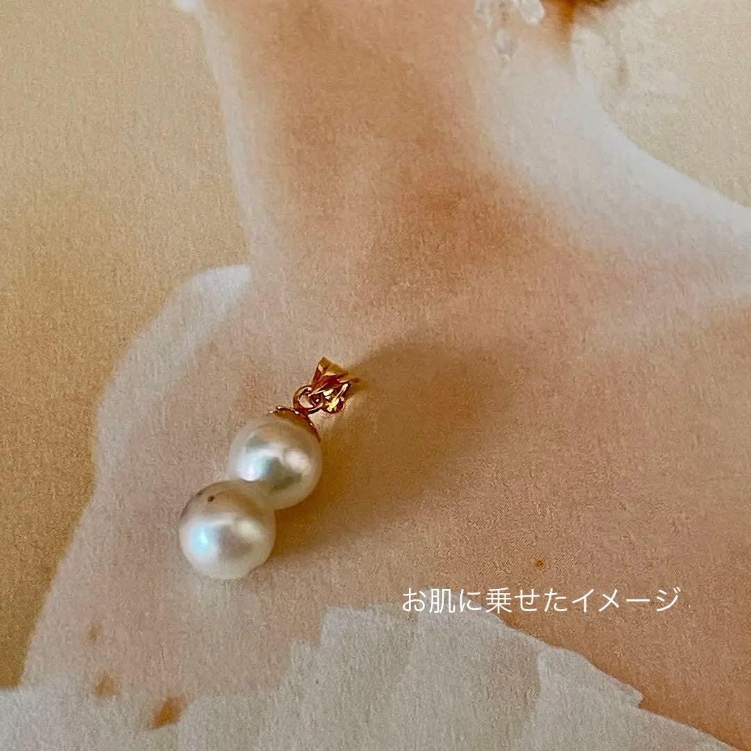 Lotus Law necklace featuring 6 mm genuine Akoya baroque pearls on 18K yellow gold chain 2 cm length
