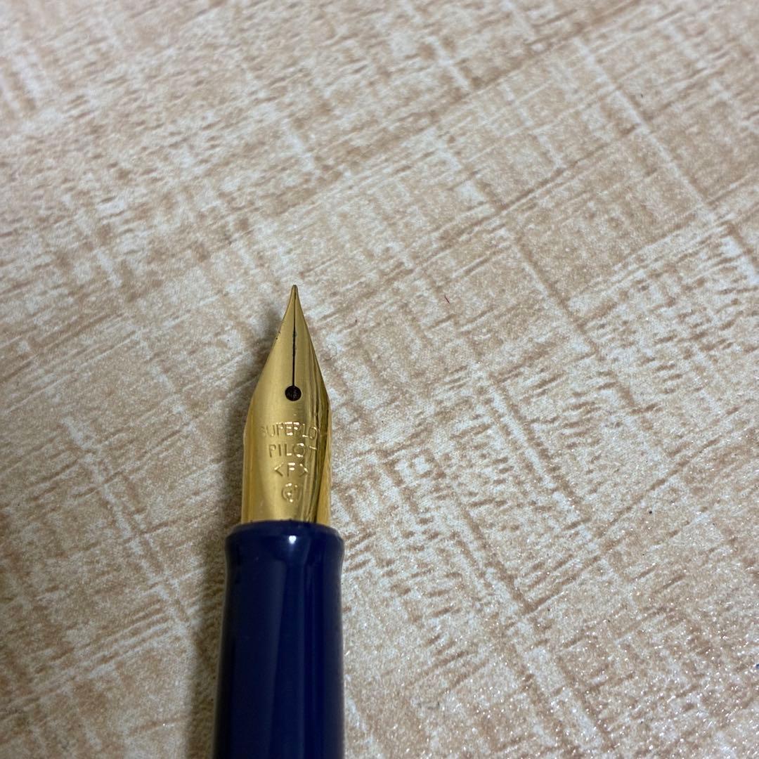 Pilot SuperLoy Mini Fountain Pen blue with fine engraved tip displayed on white background