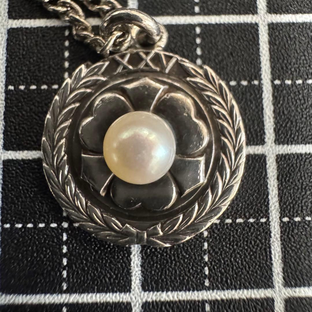 Mikimoto XXV silver wedding anniversary pendant with oxalis motif and pearl on a 46cm German silver chain
