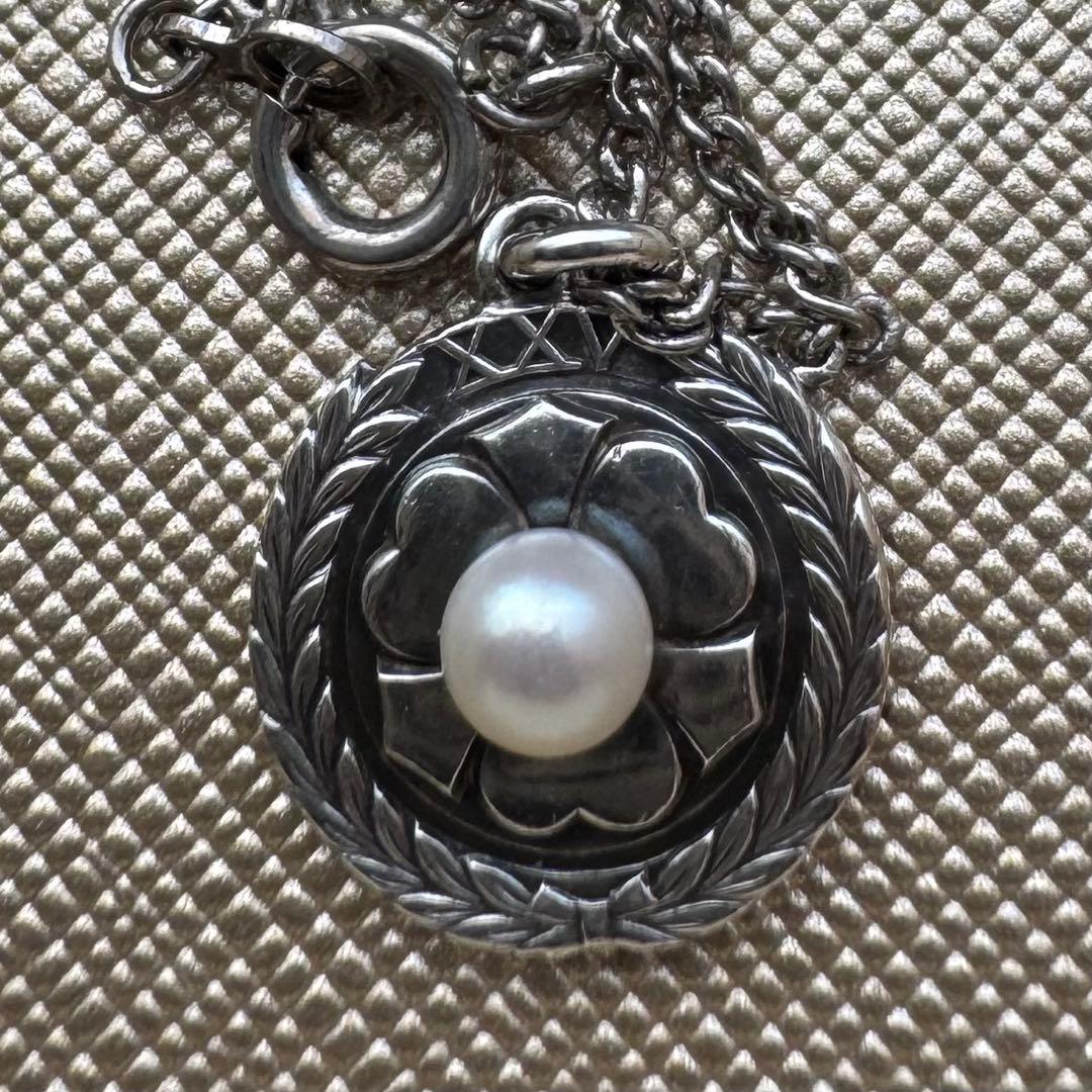 Mikimoto XXV silver wedding anniversary pendant with oxalis motif and pearl on a 46cm German silver chain