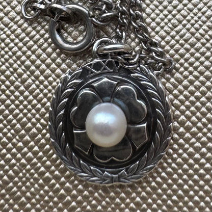 Mikimoto XXV silver wedding anniversary pendant with oxalis motif and pearl on a 46cm German silver chain