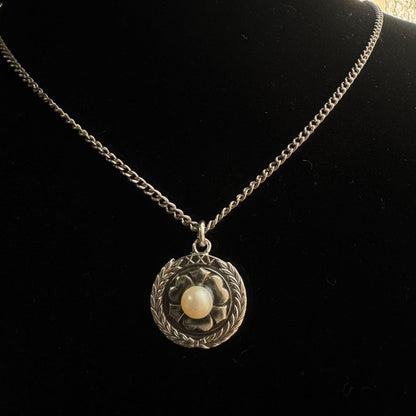 Mikimoto XXV silver wedding anniversary pendant with oxalis motif and pearl on a 46cm German silver chain