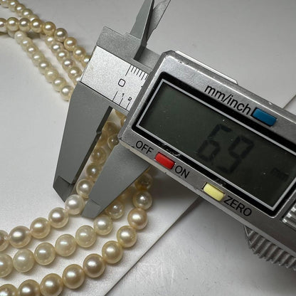 Three-strand Akoya pearl necklace with pearls measuring 6.8 to 6.9 cm in diameter